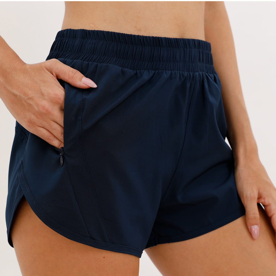 Short de sport d'été avec poches zippées, respirant, ample, anti-exposition, pour course à pied, fitness, vêtements pour femmes