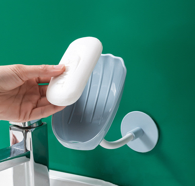 Perforation-free soap holder with creative drainage