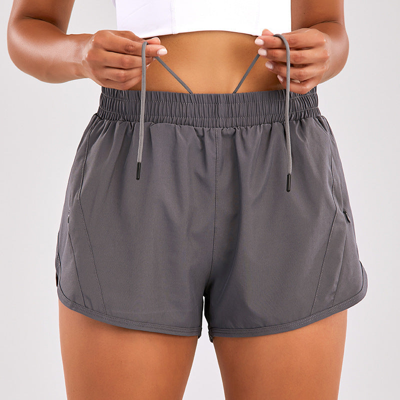 Short de sport d'été avec poches zippées, respirant, ample, anti-exposition, pour course à pied, fitness, vêtements pour femmes