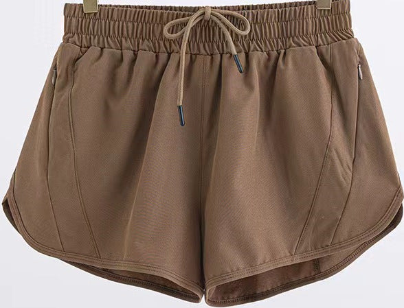 Short de sport d'été avec poches zippées, respirant, ample, anti-exposition, pour course à pied, fitness, vêtements pour femmes