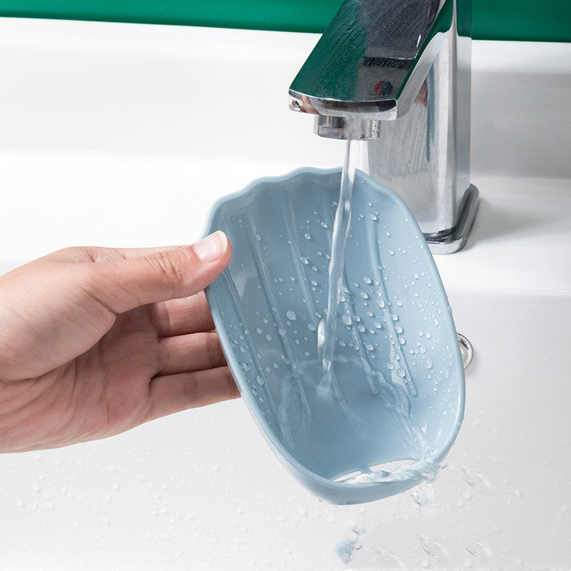 Perforation-free soap holder with creative drainage